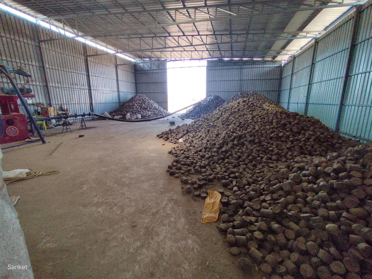 Biomass briquette manufacturing process