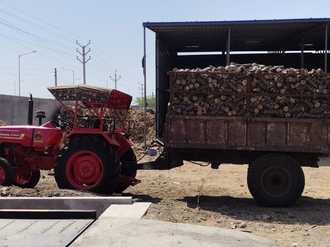 Tractor pulling biomass briquette